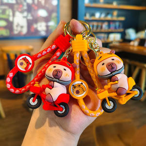 Llavero de gel de silicona Capibara en bicicleta, regalo de dibujos animados, llavero de anime lindo, colgante para bolso empaquetado individualmente - Product Image 1