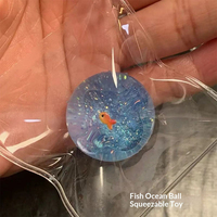 Jelly Ocean Planet Goldfish Stress Relief Ball TPR Squishy Toy Keychain Bag Charm Soft Bouncy Decompression Toy Unisex for Kids