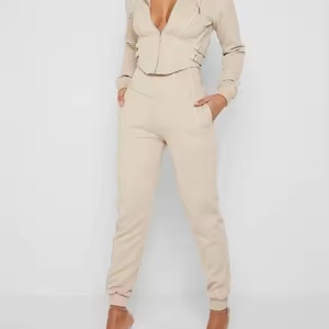 ชุดเซ็ตเสื้อฮู้ดดี้และกางเกงวอร์มคุณภาพสูงสำหรับผู้หญิง พร้อมโลโก้แบบ OEM สั่งทำได้ เสื้อฮู้ดดี้รัดรูปสีพื้น ผ้าฝ้าย 100% ชุดวอร์มสำหรับผู้หญิง - Product Image 1