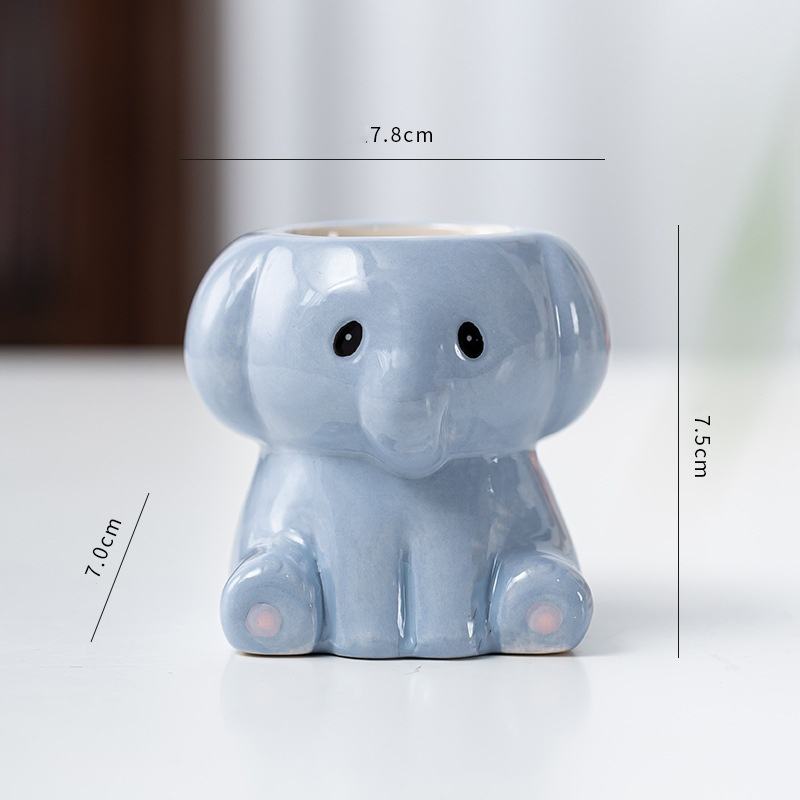 Éléphant peint en bleu clair