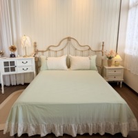 Parure de lit quatre pièces style coréen en coton brodé de dentelle, motif floral vert clair, jupe de lit, housse de couette, drap et taie d'oreiller, toutes saisons