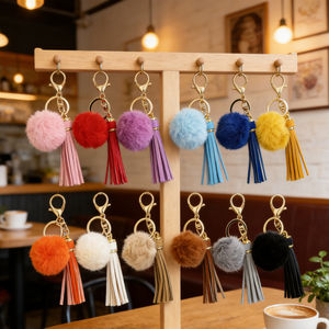 Bracelet porte-clés élastique <span class=keywords><strong>en</strong></span> perles de bois, motif rectangulaire tissé, style simple et durable, avec breloque pompon <span class=keywords><strong>en</strong></span> peluche - Product Image 1