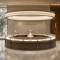 Vitrine d'îlot circulaire sur mesure pour bijoux, entièrement en verre, avec éclairage LED et comptoir à baldaquin pour magasin de luxe