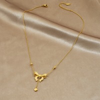 Collier pendentif cœur nœud papillon plaqué or 18 carats, chaîne à perles en acier inoxydable 316L pour femme, vente en gros personnalisée