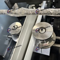 Machine de formage à froid entièrement automatique pour la fabrication de coudes circulaires de conduites d'évacuation des eaux pluviales