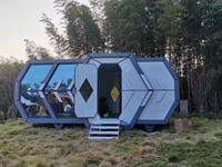 Maison conteneur en verre préfabriquée moderne de 40 pieds, petite maison alimentée par énergie solaire pour Airbnb, bureau ou hôtel