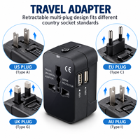 Kompakter Weltreise-Steckeradapter mit Doppel-USB-Ladeanschlüssen und Überspannungsschutz für USA, UK, EU, AU