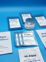Kit de cuidado de la piel de lujo con suero de ácido hialurónico, incluye crema hidratante con HA de 50 g y parche fundente para una hidratación profunda y reafirmante.