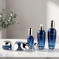 Bouteilles de crème pour le visage en verre bleu foncé, flacons pompe à lotion avec bouchon argenté, pour emballages cosmétiques et soins de la peau, directement de l'usine.
