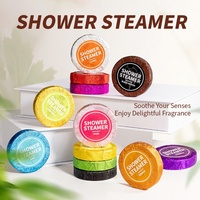 Tablettes de douche aromatiques OEM pour salle de bain, parfum de bain hôtelier 30g, hydratantes et régulières en matière d'huile, emballées individuellement