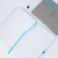 Carnet de notes promotionnel personnalisé A5 en cuir PU, couverture rigide avec sangle, style imprimé et couverture en tissu pour usage journalier