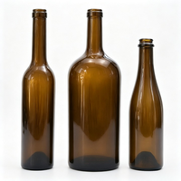 Bouteille de vin vide ronde en verre ambré vert foncé 750 ml, prix d'usine, vente chaude, bouteilles de vin en verre personnalisées pas chères avec bouchon couronne et couvercles
