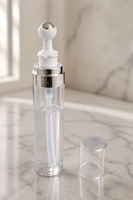 Flacon roll-on PETG 20 ml transparent pour sérum cosmétique avec col doré et tête de pression blanche