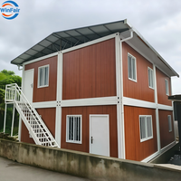 Maison conteneur préfabriquée modulaire blanche WinFair, duplex à deux niveaux avec toilettes, en vente au Ghana pour habitation