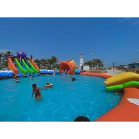 Piscine gonflable géante ronde commerciale avec toboggan sur le thème des animaux marins |   Grande zone de jeux aquatiques pour parcs aquatiques et locations