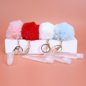 Vendita calda Clear Lip Oil Gloss simpatici bambini idratante lucidalabbra con Macaron Puff Ball Keychain Makeup - Product Image 1