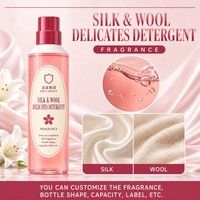 Détergent à lessive délicat en bouteille cylindrique rose corail, soie et laine, parfum longue durée, détergent liquide, produits de lavage