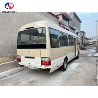 Vente en gros : Minibus Coaster d'occasion fiable avec moteur diesel 6 cylindres et configuration personnalisée pour Toyota