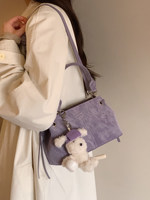 Sac seau à cordon pour femme en cuir PU texturé souple avec breloque poupée, poignée supérieure et bandoulière