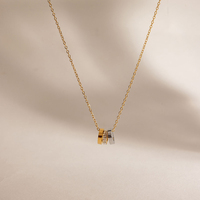 Collier pendentif triple anneau entrelacé bicolore en acier inoxydable plaqué or 18 carats, étanche, bijoux tendance pour femmes