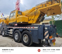 Grue mobile sur camion d'occasion XC 80 tonnes QY80L6-1 Année 2022 4001-6000 heures de fonctionnement Flèche principale 60 mètres Moteur Weichai Contrepoids 24,6 tonnes
