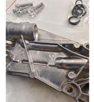 Rakitan Rumah Filter Oli dengan Pendingin untuk 12992593 25199751 55353322 55571687 93186324 untuk Chevrolet Cruze Sonic Tracker 1.8l