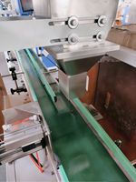 Machine d'emballage automatique de boîtes contrôlée par PLC, combinant pesage, comptage et moteur à économie d'énergie pour cartons en papier