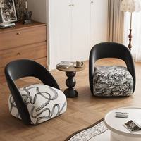 Fauteuil simple de designer nordique, design irrégulier, léger, de luxe, pivotant, style pétale, confortable pour salon, tendance