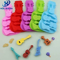 Individuelle Farbige Hitzebeständige Lebensmittelsichere Kuchendekoration 5-Gitter Coole 3D Silikon-Gitarren-Schokoladenformen für Kerzenherstellung
