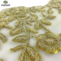 Dentelle florale dorée populaire avec broderie perlée et sequins pour robe de mariée de luxe sexy, 100 % polyester