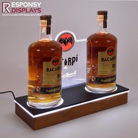 Présentoir d'alcool de comptoir en acrylique avec lumière LED pour support de vitrine de whisky Vodka dans le club de bar et le magasin de détail