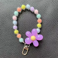 Dragonne de téléphone artisanale à fleurs perlées, avec breloque mignonne en perles de cristal acrylique, durable, légère et sécurisée, vente en gros et personnalisation