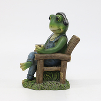 Statue de grenouille en résine sculptée avec écouteurs, figurine fantaisie assise sur une chaise pour la décoration intérieure