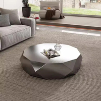Table de salon moderne et simple, design de luxe léger, modèle créatif circulaire minimaliste en acier inoxydable poli