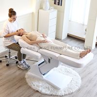 Table de massage professionnelle électrique réglable en hauteur pour salon de beauté, lit de soin des cils à plateau incurvé blanc en mousse à mémoire de forme PU