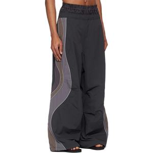 กางเกงวอร์มขาบานทรงหลวมขนาดใหญ่พิเศษ ผ้าไนลอน แต่งแถบลายทาง สไตล์ลำลอง สำหรับผู้ชาย - Product Image 2