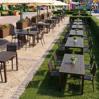 Table et chaises d'extérieur noires personnalisées, imperméables et résistantes à la rouille, pour les zones panoramiques, les cafés en plein air et les cours intérieures