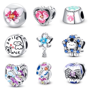 Adorable <b>silver</b>-plated white brass pendant, featuring a floral and smiling cat design, adorned with crystal rhinestones - Product Image 1