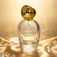Flacon de parfum en verre transparent 50ml 100ml avec bouchon irrégulier en forme de galet, capuchon doré/argenté/marron/nickel, pulvérisateur à pompe, gravure personnalisée du logo de la marque