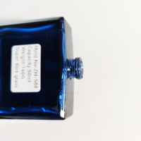 Vente en gros de bouteilles de parfum de forme carrée emballage personnalisé de 50ml 100ml flacon de parfum de luxe vide en verre avec bouchon