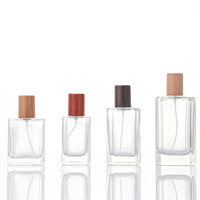 Flacons de parfum vides de luxe au design tendance 20ml/30ml/100ml, emballage en verre transparent carré à col serti avec pulvérisateur rechargeable