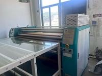 Presse à chaud à rouleaux Pengda d'occasion, machine à transfert textile à rouleaux PD-1800D-600 pour impression par sublimation sur tissu polyester