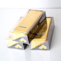 Tirelire en forme de lingot d'or en plastique