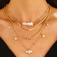 Collier ras du cou vintage style gothique punk avec croix en perles superposées, chaîne à maillons imitation perles, pendentif croix florale plaqué or