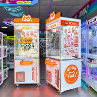 Machine à griffes métallique commerciale personnalisée en usine, console de jeu d'arcade de divertissement, grue à cadeaux et peluches, accepteur de billets anglais, Naughty, 1 an