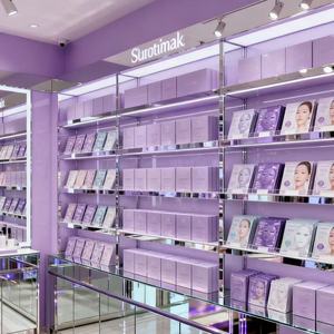 Meubles de présentation cosmétique professionnels : armoires à maquillage LED personnalisées, présentoirs rotatifs et stands d'îlot central - Product Image 3