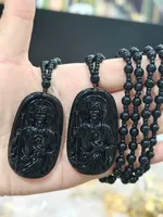 Collier pendentif en verre imitation obsidienne noire avec statue de San Benito et chaîne perlée, style ethnique, bijou cadeau