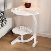 Table d'appoint moderne compacte avec plateau en pierre frittée et pieds en métal courbés