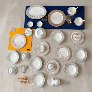 Nordic Style Elegant Ceramic <b>Dinnerware</b> <b>Set</b> Unique Embossed Surface Sustainable Engraving Technique Includes Plates and Bowls - Product Image 1