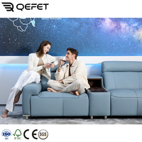 Canapés inclinables électriques avec porte-gobelets intégrés Console centrale Canapé moderne en cuir avec appui-tête électrique et soutien lombaire